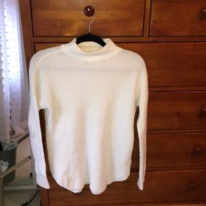 White turtleneck sweater